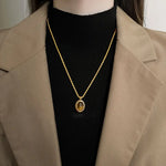Golden Stainless Steel Necklace with Tiger Eye Stone – Fashionable Twisted Design for Women