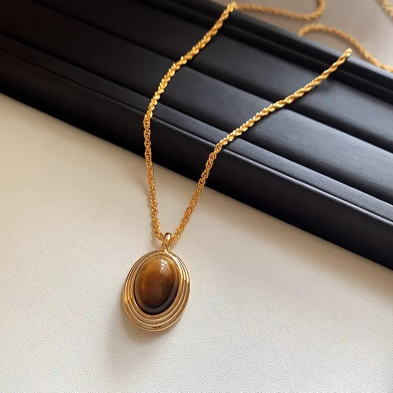 Golden Stainless Steel Necklace with Tiger Eye Stone – Fashionable Twisted Design for Women
