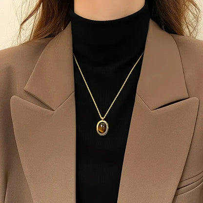 Golden Stainless Steel Necklace with Tiger Eye Stone – Fashionable Twisted Design for Women