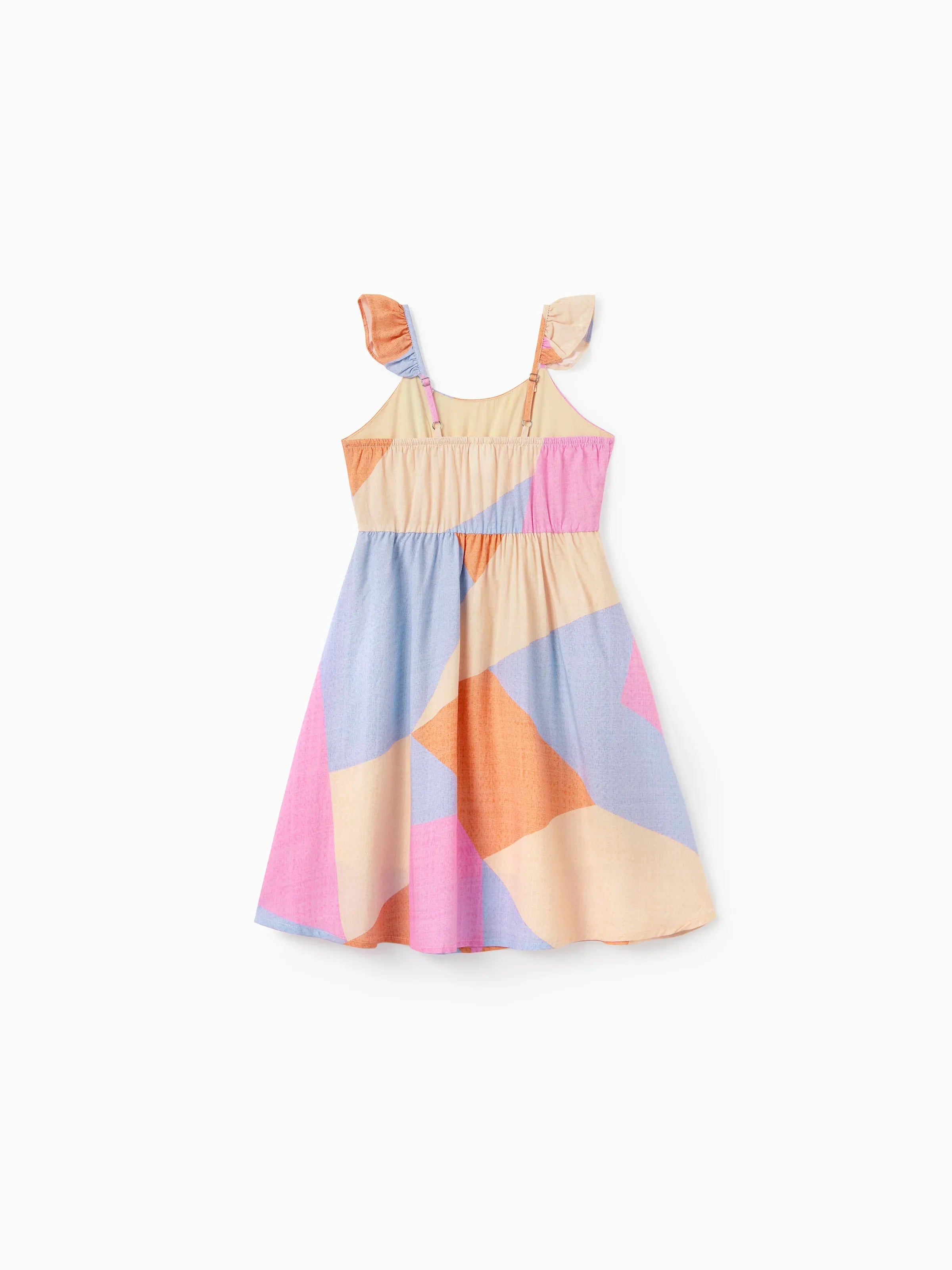 Colorful geometric-patterned dress on a white background