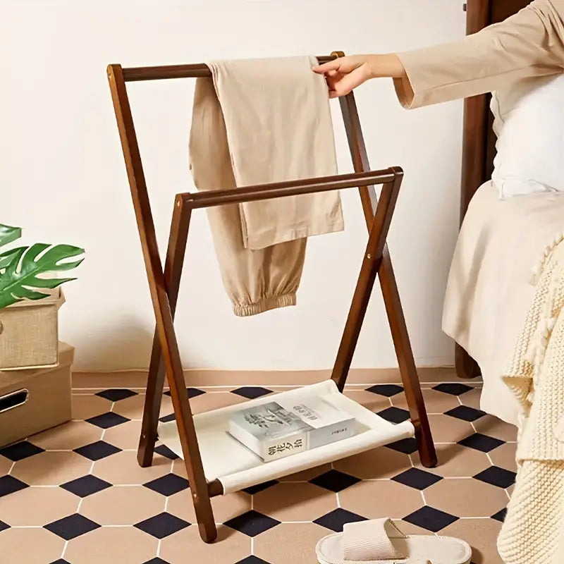 Foldable solid wooden clothes rack with large storage capacity for bedroom wardrobe organization